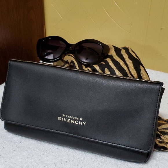 Givenchy Handbags - Givenchy Clutch - black & sleek! $29